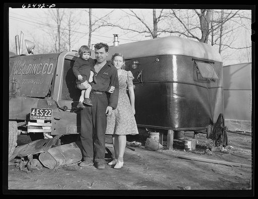 Construction worker and family living in trailer camp. Portsmouth, Virginia