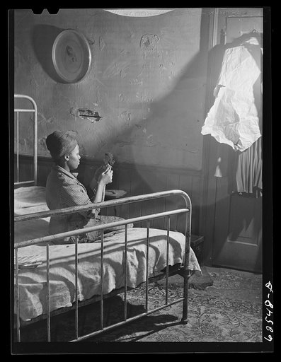 Bedroom. House in Negro slum district. Norfolk, Virginia