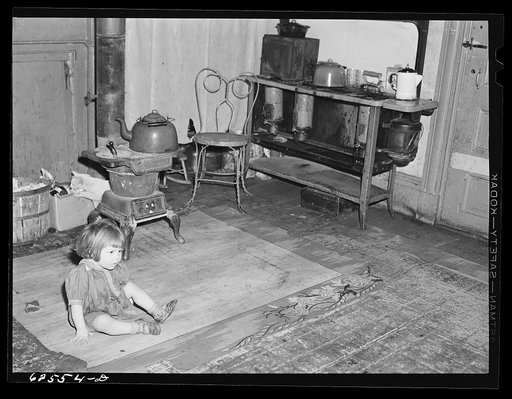 Child of defense worker from North Carolina who lives with family (wife and three children) in one room apartment in Helping Hand Mission. Portsmouth, Virginia