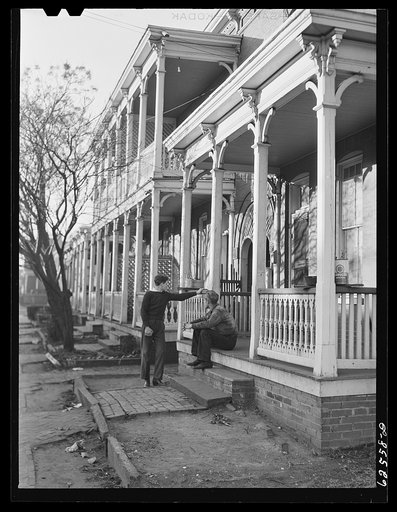 Defense workers in front of rooming houses. Norfolk, Virginia