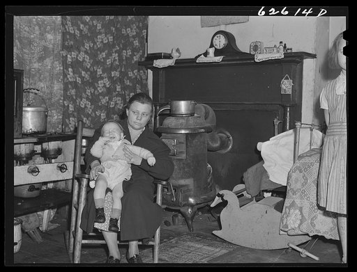 Mother and child of destitute family of five living in one room at Helping Hand Mission. Portsmouth, Virginia