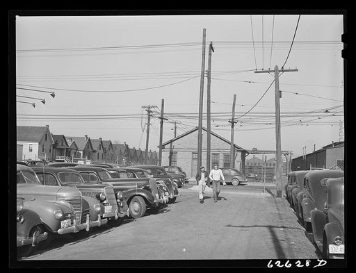 Workers' cars packed near shipyard. Newport News, Virginia