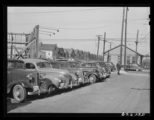 Untitled photo, possibly related to: Workers' cars packed near shipyard. Newport News, Virginia