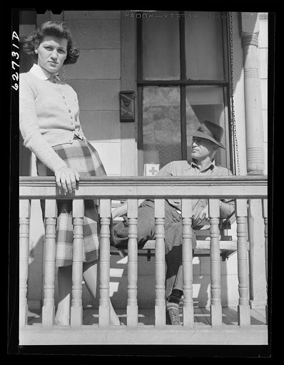 Untitled photo, possibly related to: Front porch, rooming house. Portsmouth, Virginia