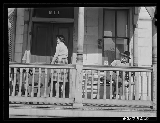 Untitled photo, possibly related to: Front porch, rooming house. Portsmouth, Virginia