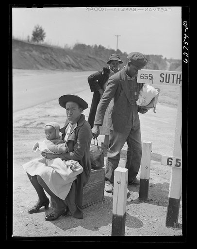 Negro family waiting for ride into town. Halifax County, Virginia