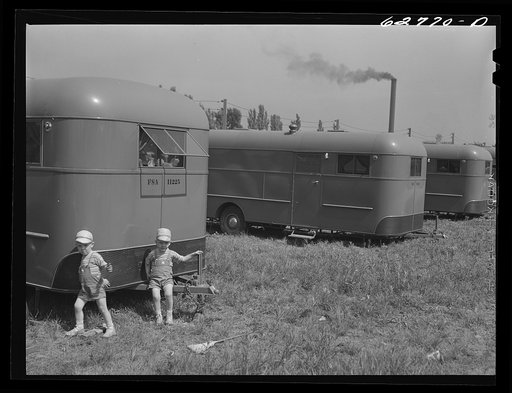 Untitled photo, possibly related to: "Trailer service unit" of water faucet and garbage pail is provided for every ten trailers at FSA (Farm Security Administration) camp. Erie, Pennsylvania