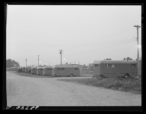 Untitled photo, possibly related to: Each group of ten trailers in the FSA (Farm Security Administration) camp at Erie has a "trailer service unit," water faucet, slop sink, and garbage pail