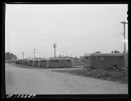 Untitled photo, possibly related to: Each group of ten trailers in the FSA (Farm Security Administration) camp at Erie has a "trailer service unit," water faucet, slop sink, and garbage pail