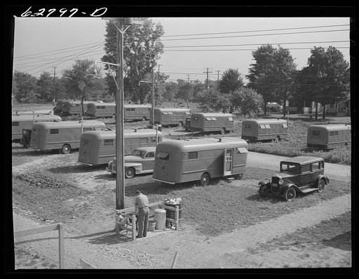 Each group of ten trailers in the FSA (Farm Security Administration) camp at Erie has a "trailer service unit," water faucet, slop sink, and garbage pail