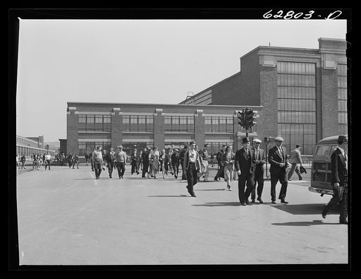 Untitled photo, possibly related to: General Electric workers leaving the plant at 4:00 p.m. Another shift comes on immediately; they are running twenty-four hours. About 10,000 are now employed here and the figure is going up each week. Erie, Pennsylvania