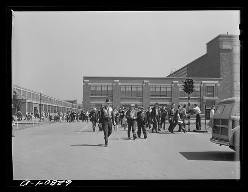 General Electric workers leaving the plant at 4:00 p.m. Another shift comes on immediately; they are running twenty-four hours. About 10,000 are now employed here and the figure is going up each week. Erie, Pennsylvania