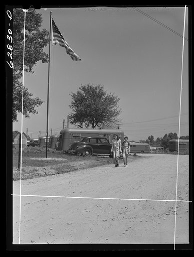 FSA (Farm Security Administration) trailer camp for defense workers, Erie, Pennsylvania. Flag and flagpole were donated by the General Electric plant