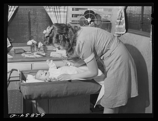 Untitled photo, possibly related to: Wife and child of worker at General Electric plant in trailer home at FSA (Farm Security Administration) camp. Erie, Pennsylvania