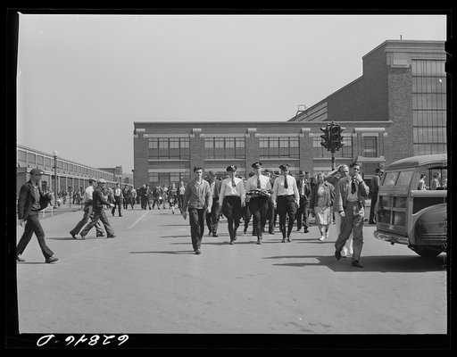 Untitled photo, possibly related to: General Electric workers leaving the plant at 4:00 p.m. Another shift comes on immediately; they are running twenty-four hours. About 10,000 are now employed here and the figure is going up each week. Erie, Pennsylvania