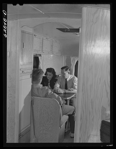 Untitled photo, possibly related to: Evening visitors at the trailer of Milton B. Ackerman, FSA (Farm Security Administration) camp manager. Erie, Pennsylvania