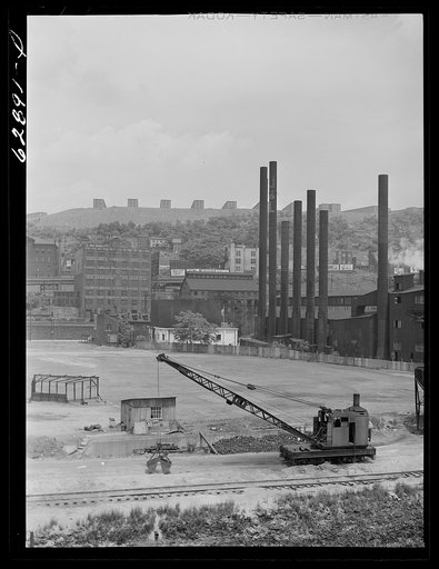 Jones Laughlin steel company. USHA (United States Housing Authority) housing project on top of hill. Pittsburgh, Pennsylvania