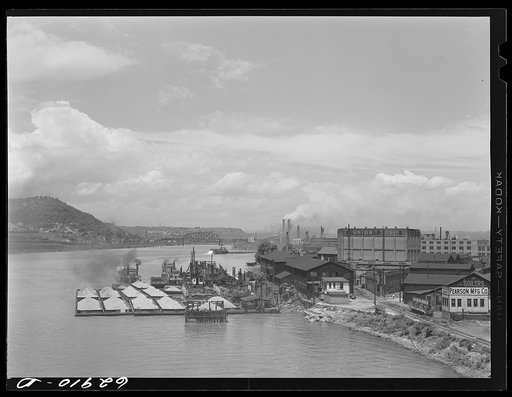 Sand barges on the river. Pittsburgh, Pennsylvania