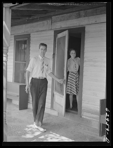 Untitled photo, possibly related to: Paul Sharpe, supervisor of FSA (Farm Security Administration) relocation project at Burns City, Indiana, talking with two of the farmers who will be moved during construction of naval ammunition depot