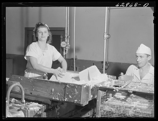 Preparing butter for packaging. Land O'Lakes plant, Chicago, Illinois