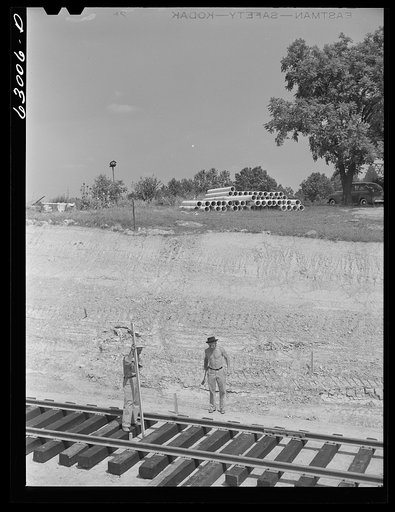 Surveyors at work in Martin County, Indiana where naval ammunition depot is being constructed on 42,000 acre tract. 160 families will be displaced