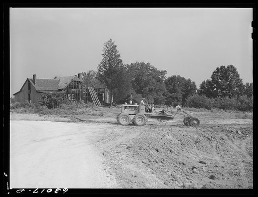 Untitled photo, possibly related to: Road construction where garden was last year. Construction of naval ammunition depot. Martin County, Indiana