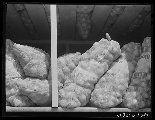 Untitled photo, possibly related to: Carload of onions at railroad terminal. Chicago, Illinois