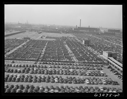 Union Stockyards, Chicago, Illinois. Employees' parking lot in the foreground