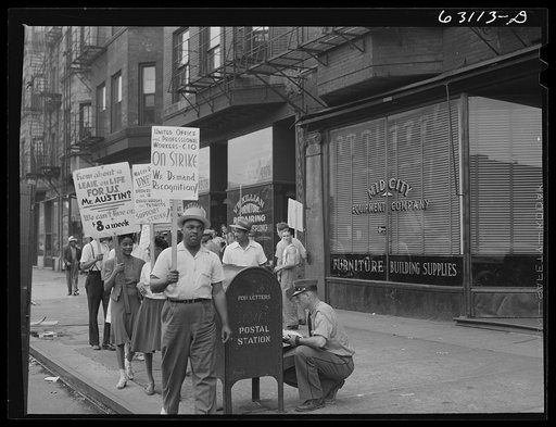 Picket line in front of Mid-City Realty Company. South Chicago, Illinois