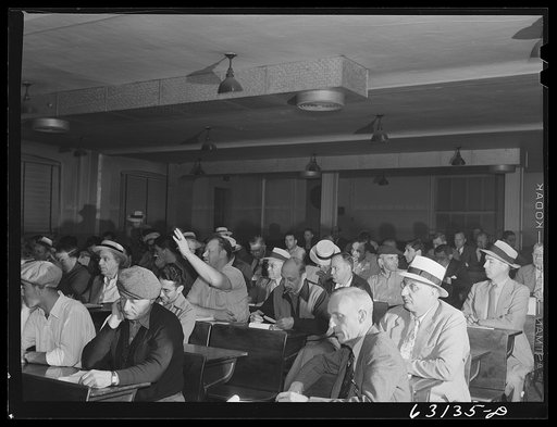 Commission merchants and their agents at early morning auction at fruit terminal. Chicago, Illinois. Auctions are held every morning but Sunday