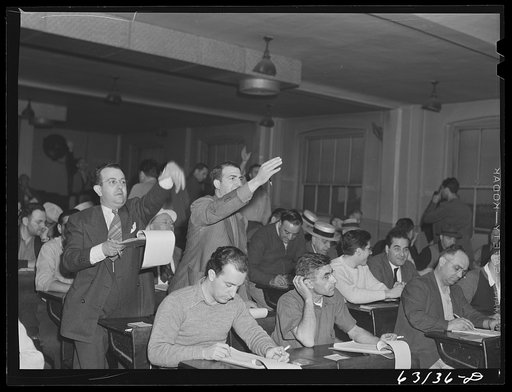Commission merchants and their agents at early morning auction at fruit terminal, Chicago, Illinois. Auctions are held every morning but Sunday
