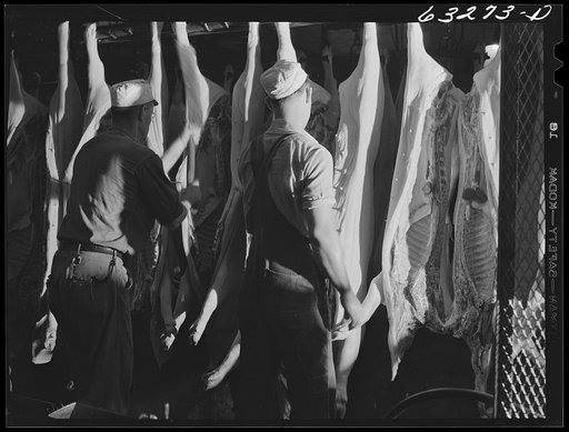 Untitled photo, possibly related to: Government inspection of hog carcasses. Packing plant, Austin, Minnesota