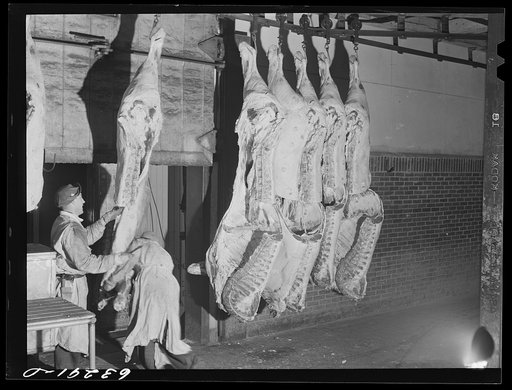 Loading beef into refrigerated freight car. Packing plant, Austin, Minnesota