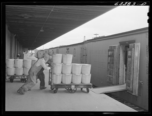 Loading tubs of butter onto freight car. Land O'Lakes plant. Minneapolis, Minnesota
