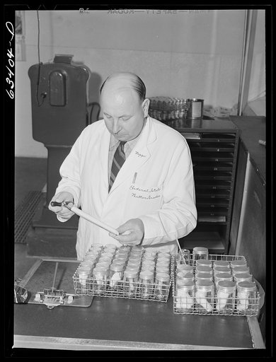 Federal butter inspector. Land O'Lakes plant, Minneapolis, Minnesota