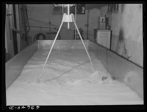 Untitled photo, possibly related to: Rural cheese maker operates small factory with help of his daughter. Near Portage, Wisconsin