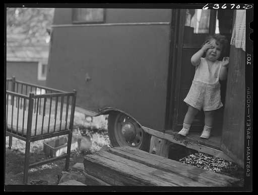 Child of defense worker from Flint living in Edgewater trailer camp near Ypsilanti, Michigan, where his father works at new Ford bomber plant