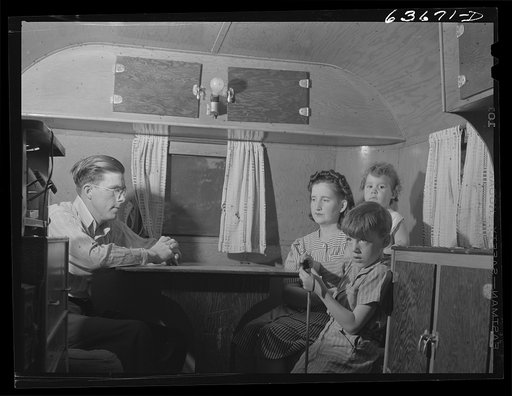 Mr. and Mrs. Birch and family in trailer in Edgewater trailer camp near Ypsilanti, Michigan. Mrs. Birch and the children share the trailer with another family. Mr. Birch lives in a tent nearby with two men. Rent: six dollars a week for trailer space; five dollars a week for tent. Mr. Birch works at 