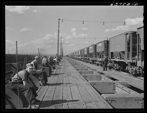 Ore punchers waiting for cars of iron ore to come in. Allouez, Wisconsin