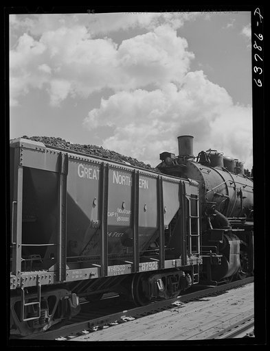 Ore from the Minnestota iron range onto docks at Allouez, Wisconsin