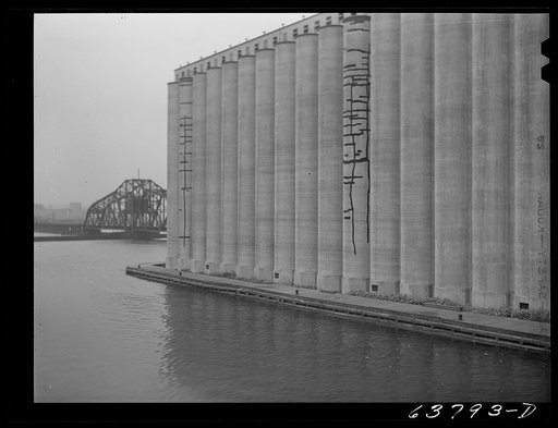Untitled photo, possibly related to: Great Northern grain elevator in Superior, Wisconsin. City of Duluth, Minnesota in background
