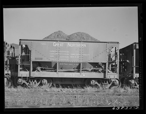 Car of iron ore from the Minnesota range in Great Northern Railroad yards. Superior, Wisconsin