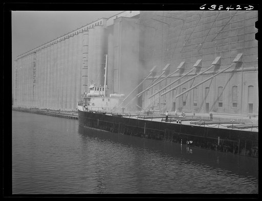 Loading grain boats at Great Northern elevator. Superior, Wisconsin
