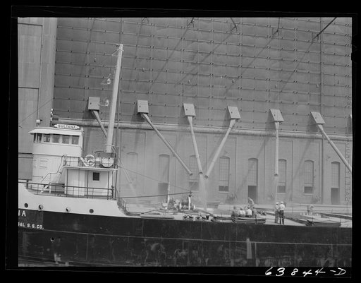 Untitled photo, possibly related to: Loading grain boat at Great Northern elevator. Superior, Wisconsin