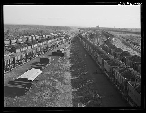 Iron ore from the Minnesota range in Great Northern Railroad yards at Superior, Wisconsin