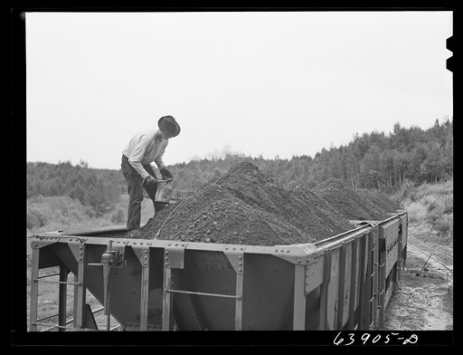 Untitled photo, possibly related to: Taking sample of iron ore before it leaves the concentration plant. Bovey, Minnesota