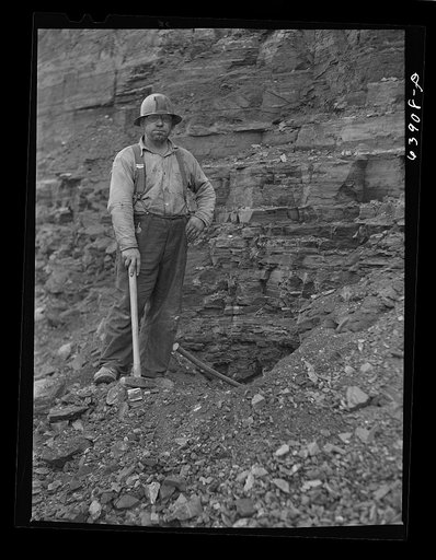 Member of blasting crew at Albany Mine near Hibbing, Minnesota