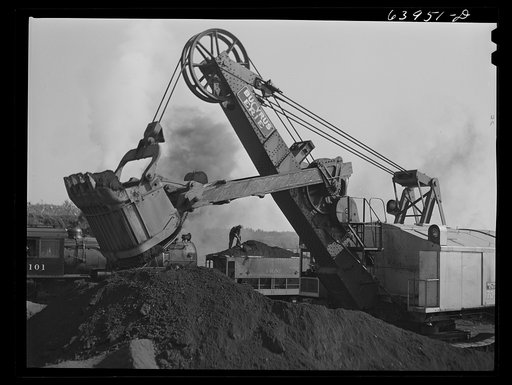 Loading seventy ton cars with iron ore, Mahoning pit, Hibbing, Minnesota