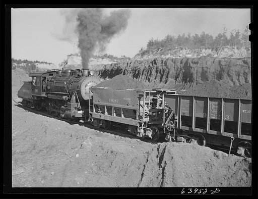 Untitled photo, possibly related to: Carloads of iron ore at Mahoning pit. Hibbing, Minnesota