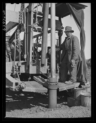 Vertical drill boring hole for blasting, Mahoning pit. Hibbing, Minnesota